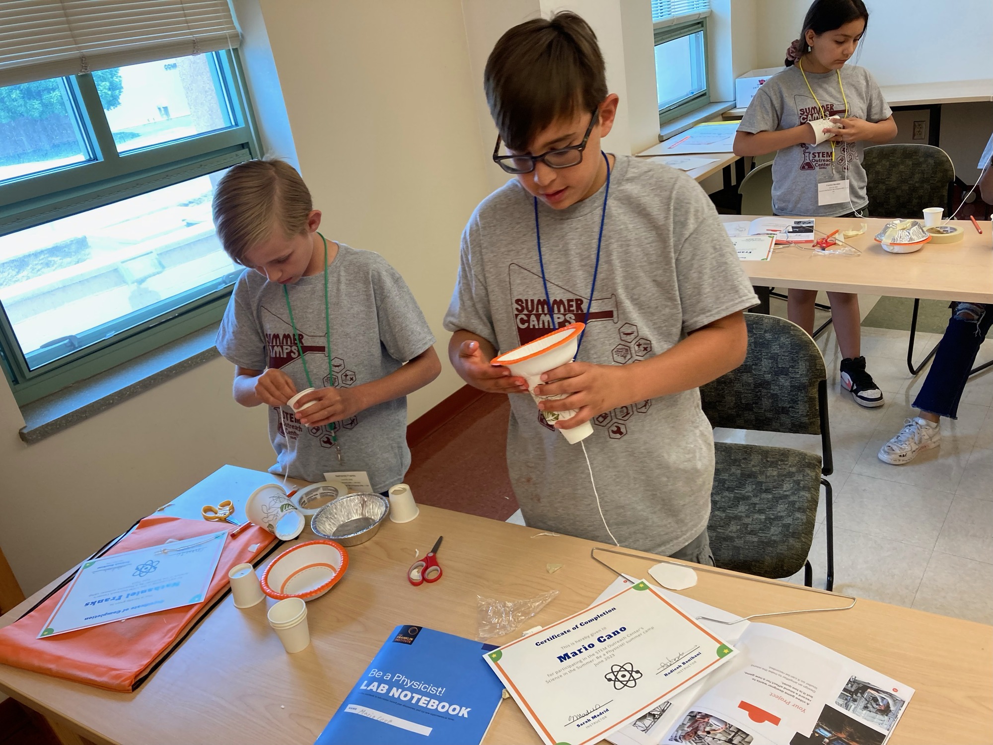 Campers exploring sound energy